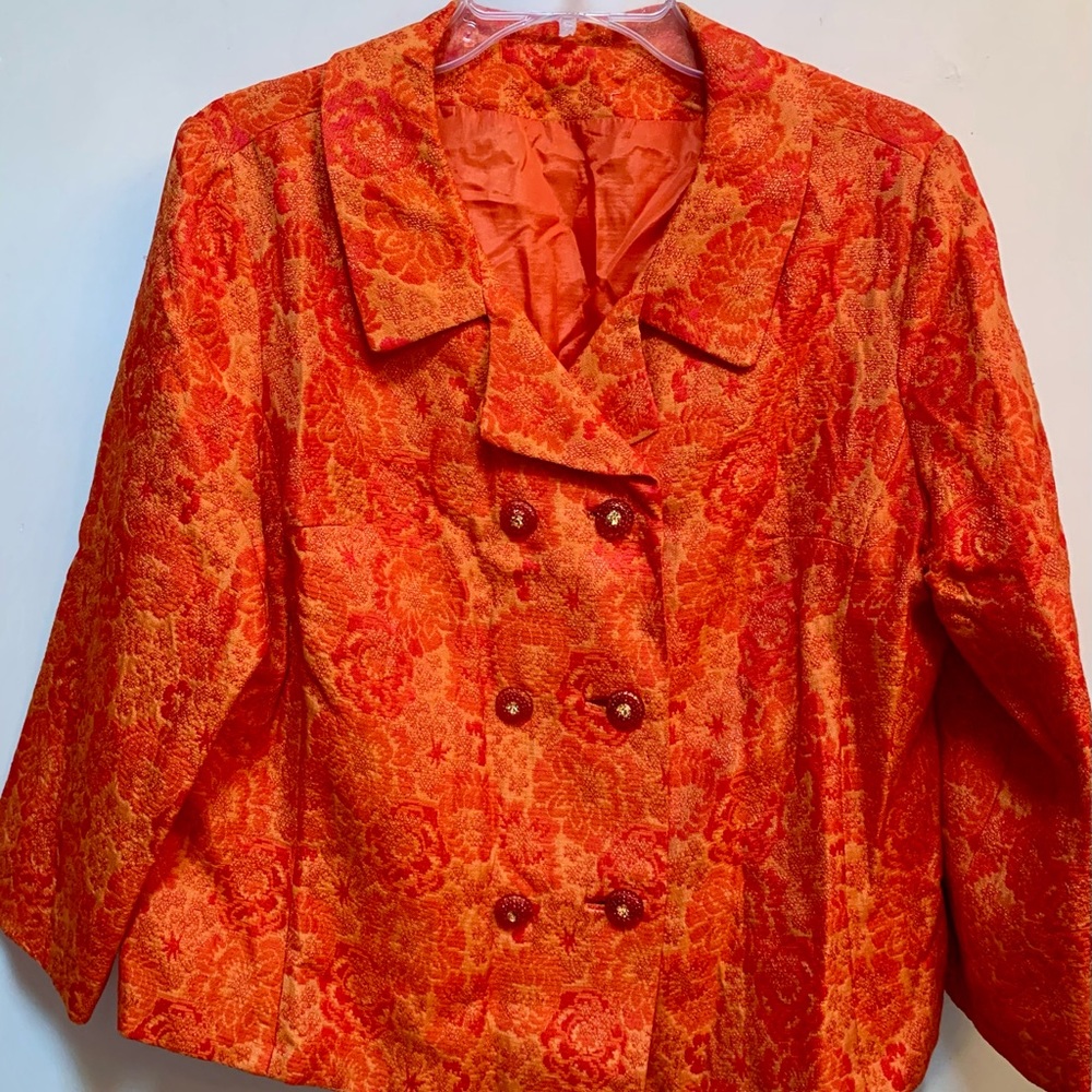 Vintage early 60’s orange brocade jacket with original rhinestone buttons.